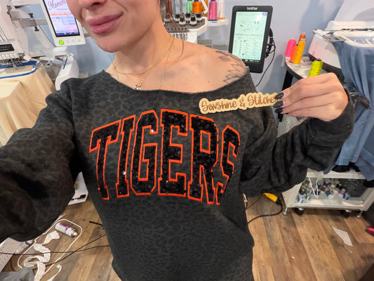 Off the shoulder leopard sweatshirt